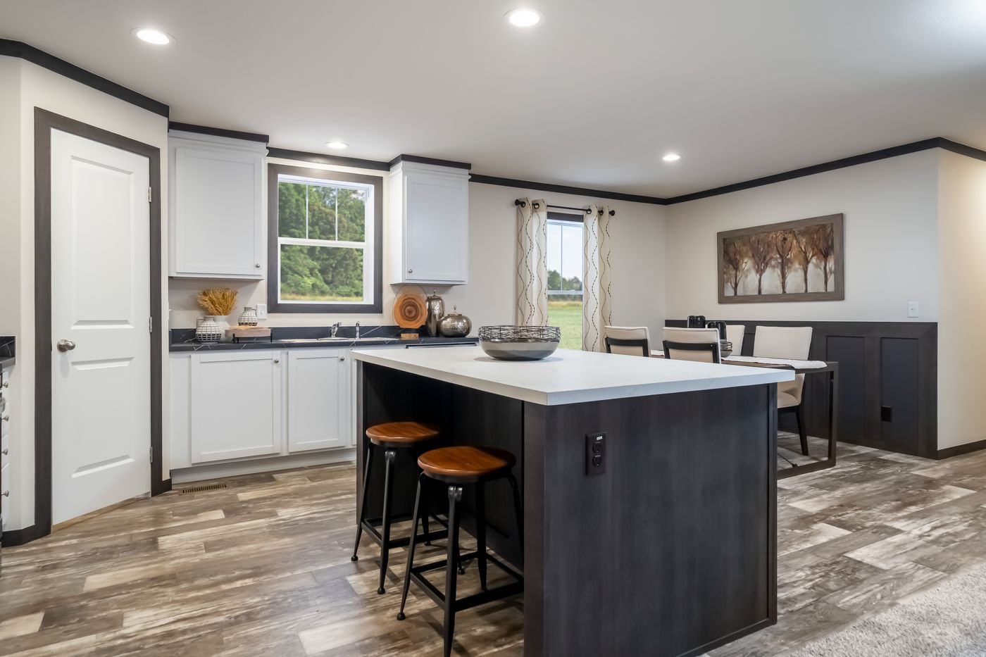 The 5628-MS067-2 HUNTINGTON Dining Area. This Manufactured Mobile Home features 4 bedrooms and 2 baths.