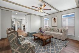 The ANNIVERSARY 16763F Living Room. This Manufactured Mobile Home features 3 bedrooms and 2 baths.