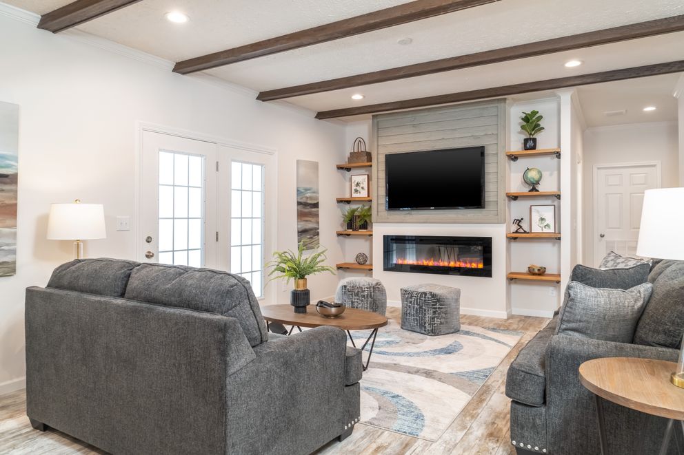 The 1444 CAROLINA Family Room. This Manufactured Mobile Home features 4 bedrooms and 2 baths.