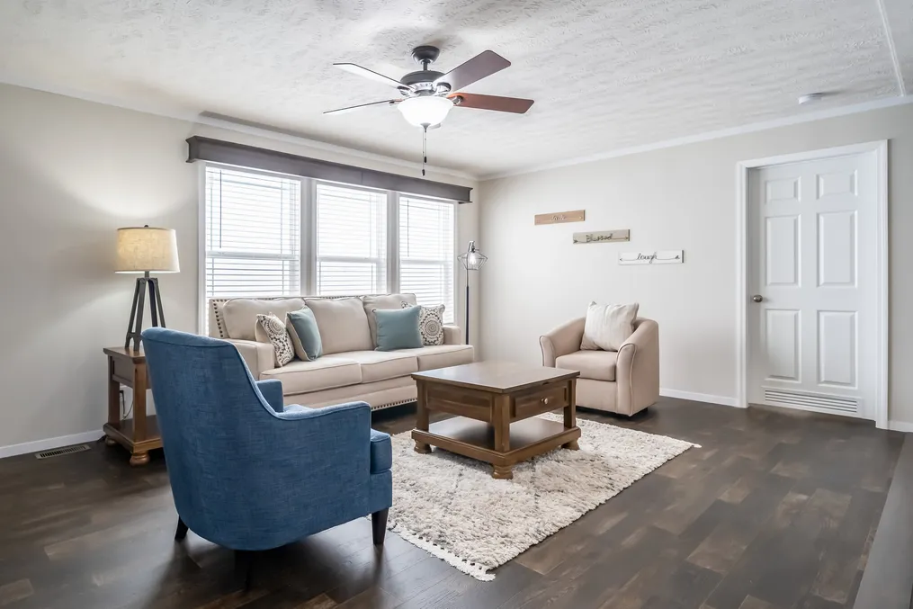 The MAVERICK 56A Living Room. This Manufactured Mobile Home features 3 bedrooms and 2 baths.