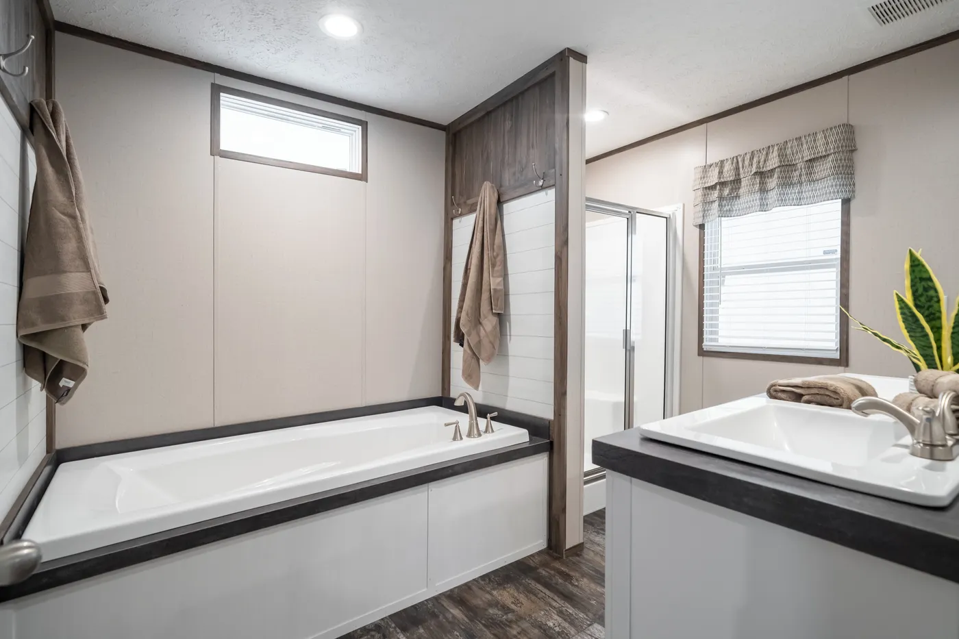 The THE GENERAL Primary Bathroom. This Manufactured Mobile Home features 3 bedrooms and 2 baths.