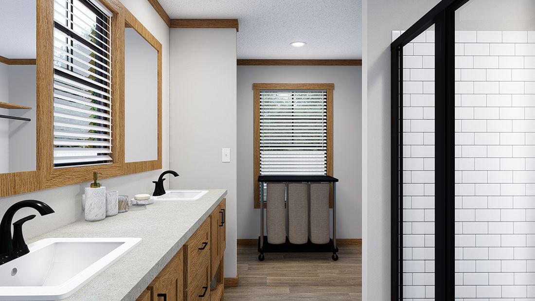 The LORALEI Master Bathroom. This Manufactured Mobile Home features 3 bedrooms and 2 baths.