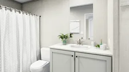 The LEGEND 16X72 COASTAL BREEZE I Primary Bathroom. This Manufactured Mobile Home features 3 bedrooms and 2 baths.