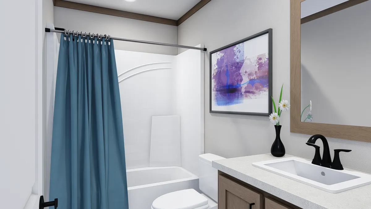 The TRINITY 76 Guest Bathroom. This Manufactured Mobile Home features 3 bedrooms and 2 baths.