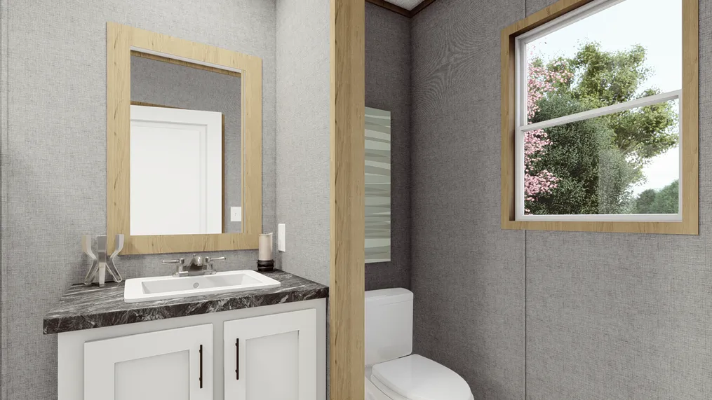 The CLARK 7016-1066 Master Bathroom. This Manufactured Mobile Home features 3 bedrooms and 2 baths.