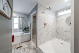 The CASCADE Primary Bathroom. This Manufactured Mobile Home features 4 bedrooms and 2 baths.
