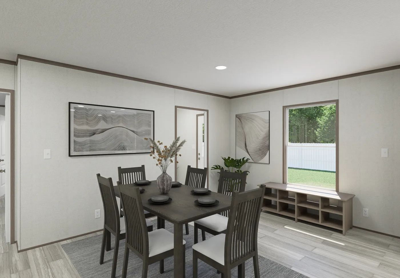 The THE MOUNTAINEER 64 Dining Room. This Manufactured Mobile Home features 3 bedrooms and 2 baths.