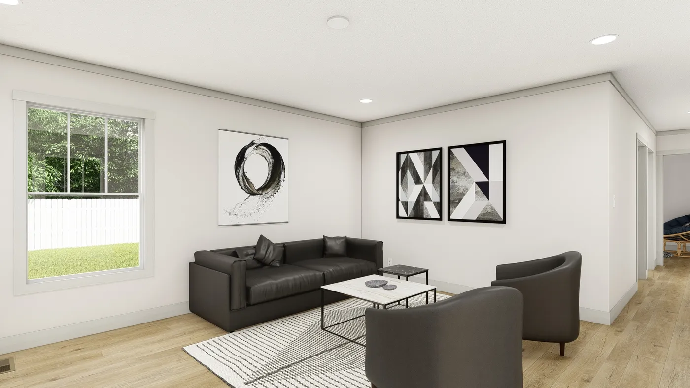 The 1676 SWEET CAROLINE Living Room. This Manufactured Mobile Home features 3 bedrooms and 2 baths.