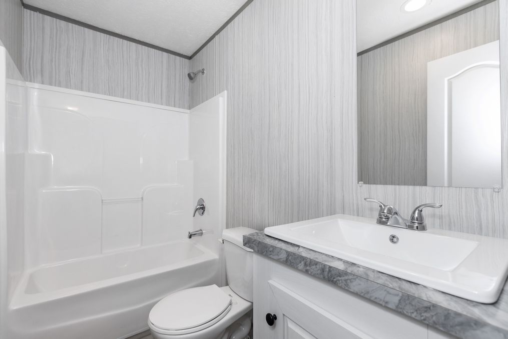 The MAYNARDVILLE CLASSIC 56 Guest Bathroom. This Manufactured Mobile Home features 2 bedrooms and 2 baths.