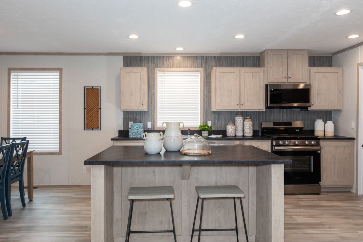 The 5628-5202 ADRENALINE Kitchen. This Manufactured Mobile Home features 3 bedrooms and 2 baths.