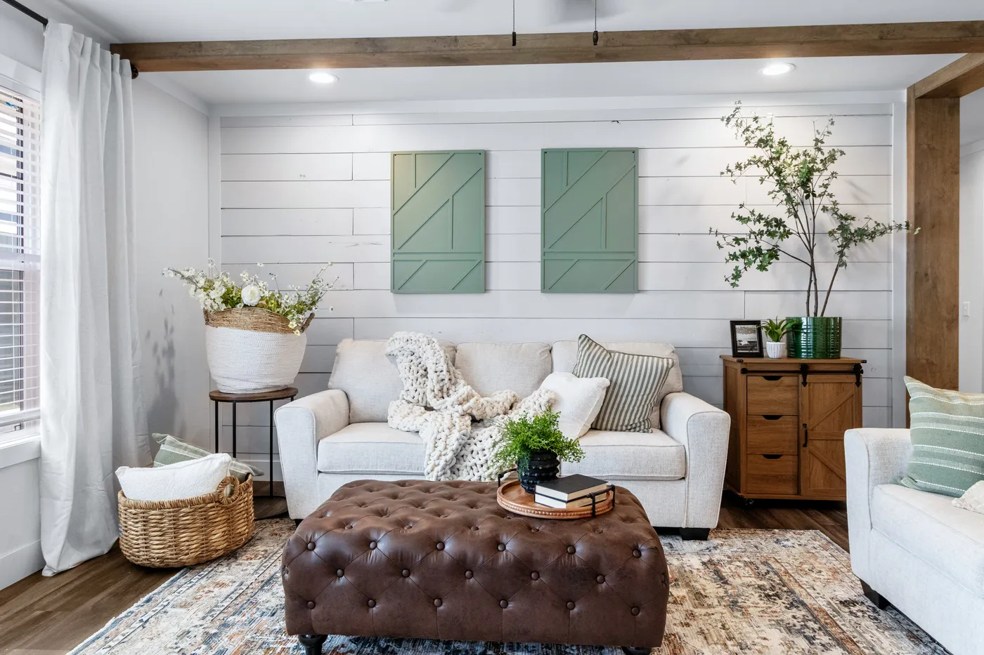 The SAWYER ELITE Living Room. This Manufactured Mobile Home features 3 bedrooms and 2 baths.