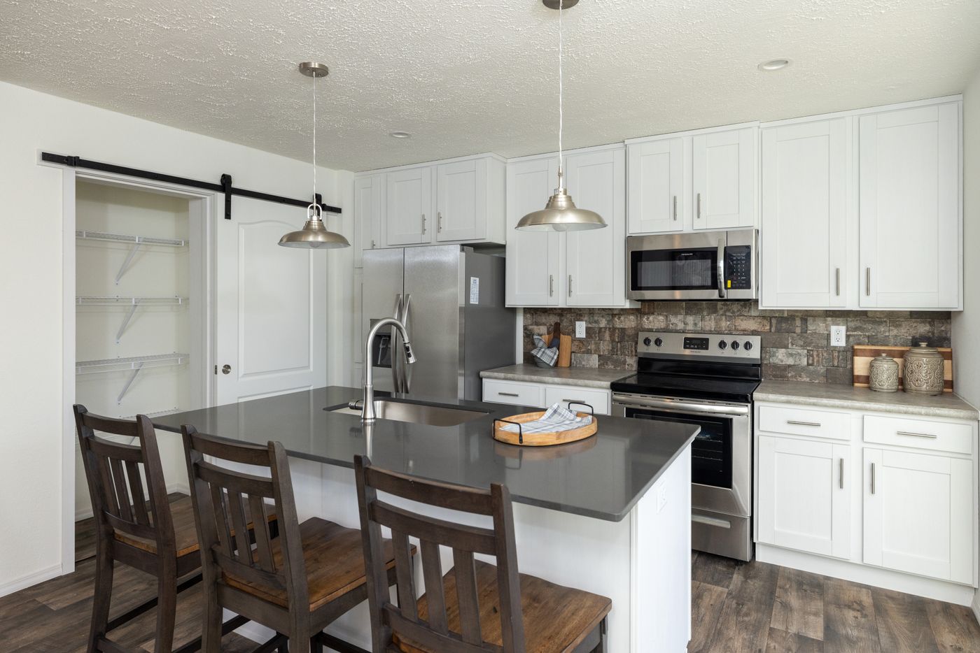 The THE WASHINGTON MOD Kitchen. This Modular Home features 3 bedrooms and 2 baths.