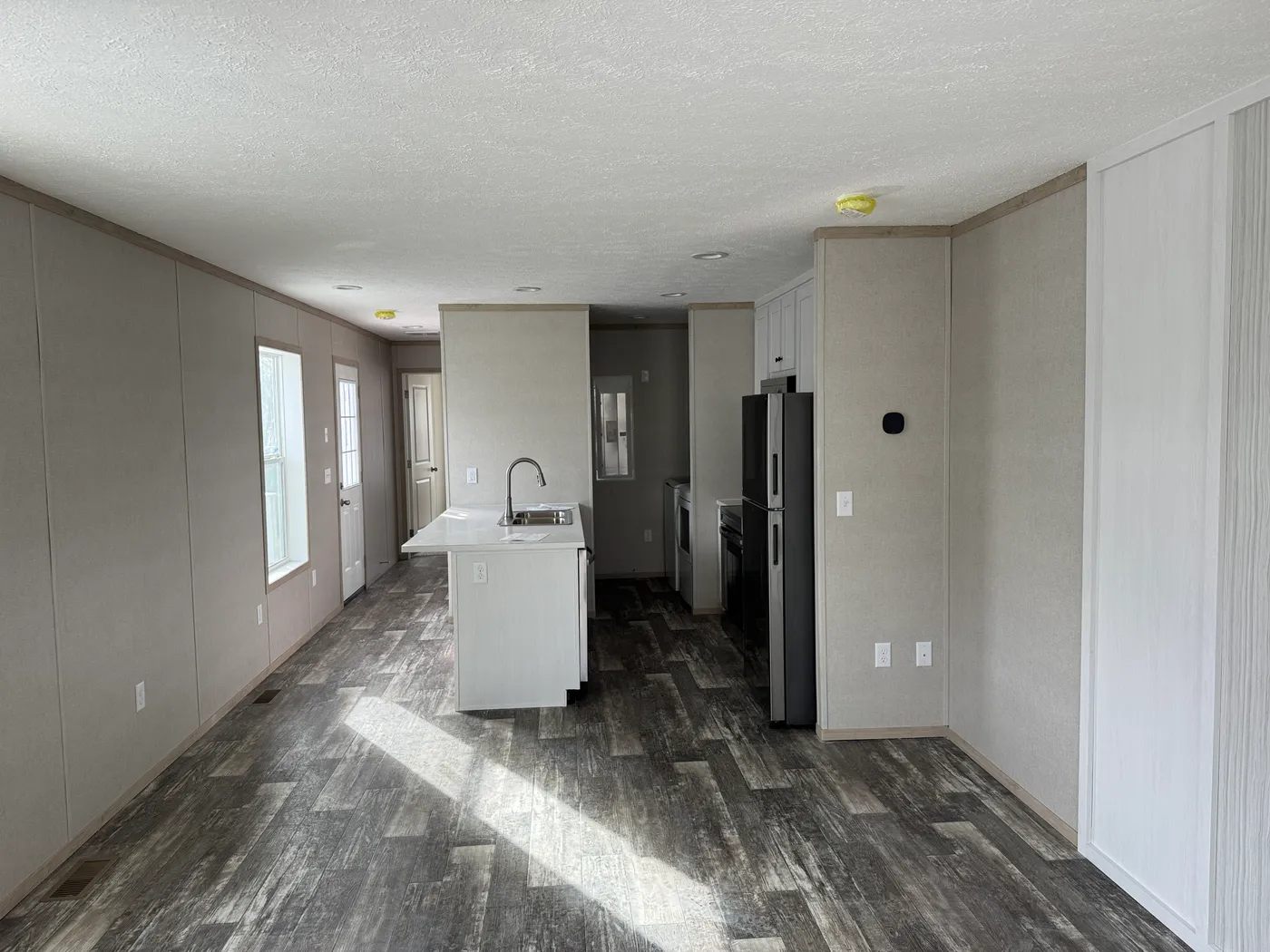 The ONYX Living Room. This Manufactured Mobile Home features 1 bedroom and 1 bath.