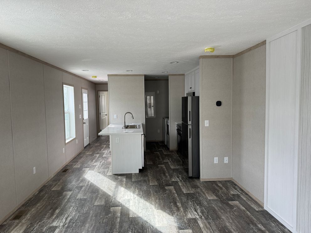 The ONYX Living Room. This Manufactured Mobile Home features 1 bedroom and 1 bath.