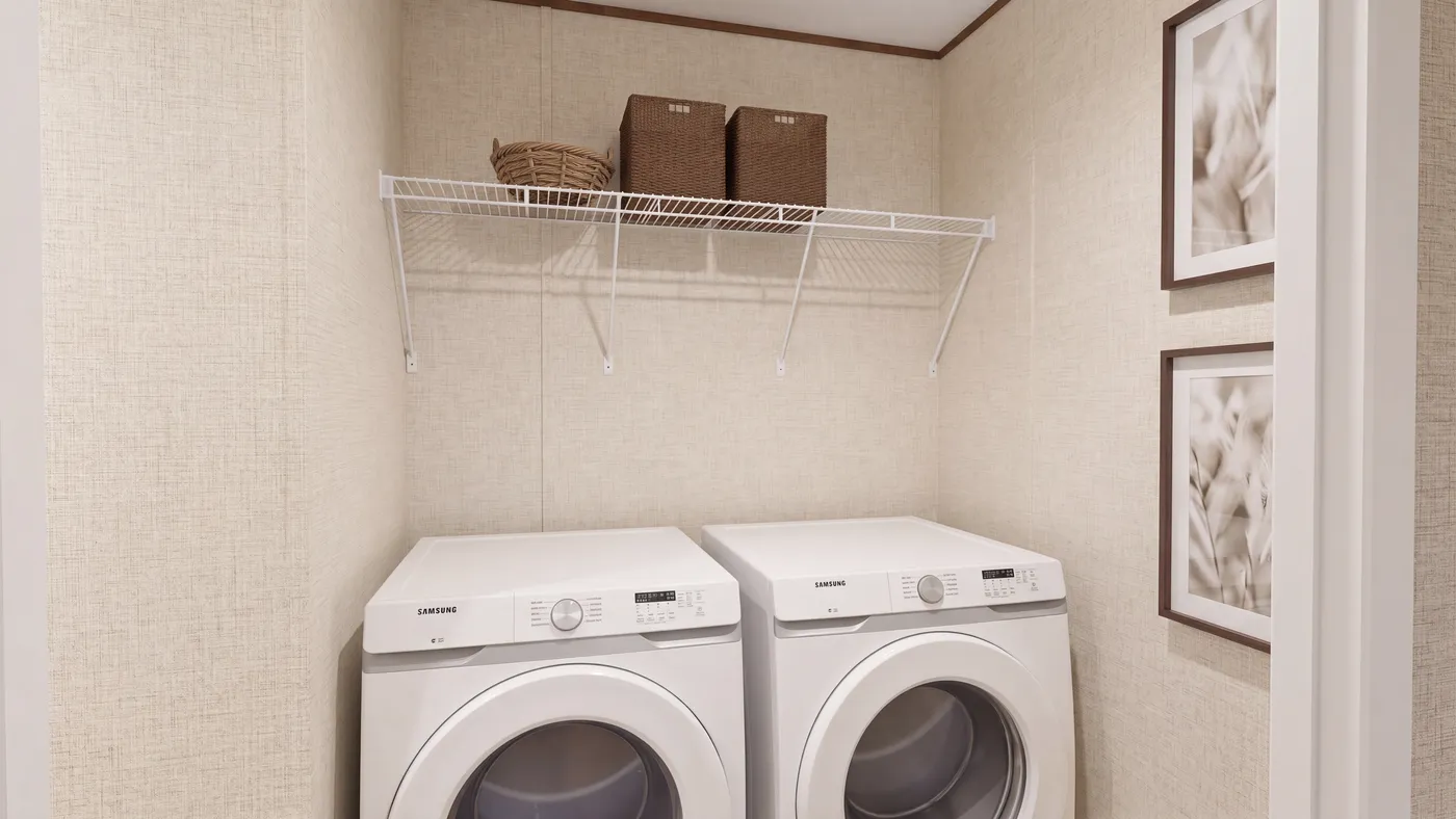 The OAK Utility Room. This Manufactured Mobile Home features 4 bedrooms and 2 baths.