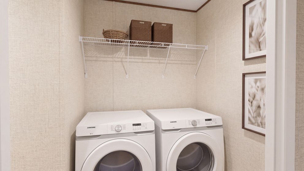 The OAK Utility Room. This Manufactured Mobile Home features 4 bedrooms and 2 baths.