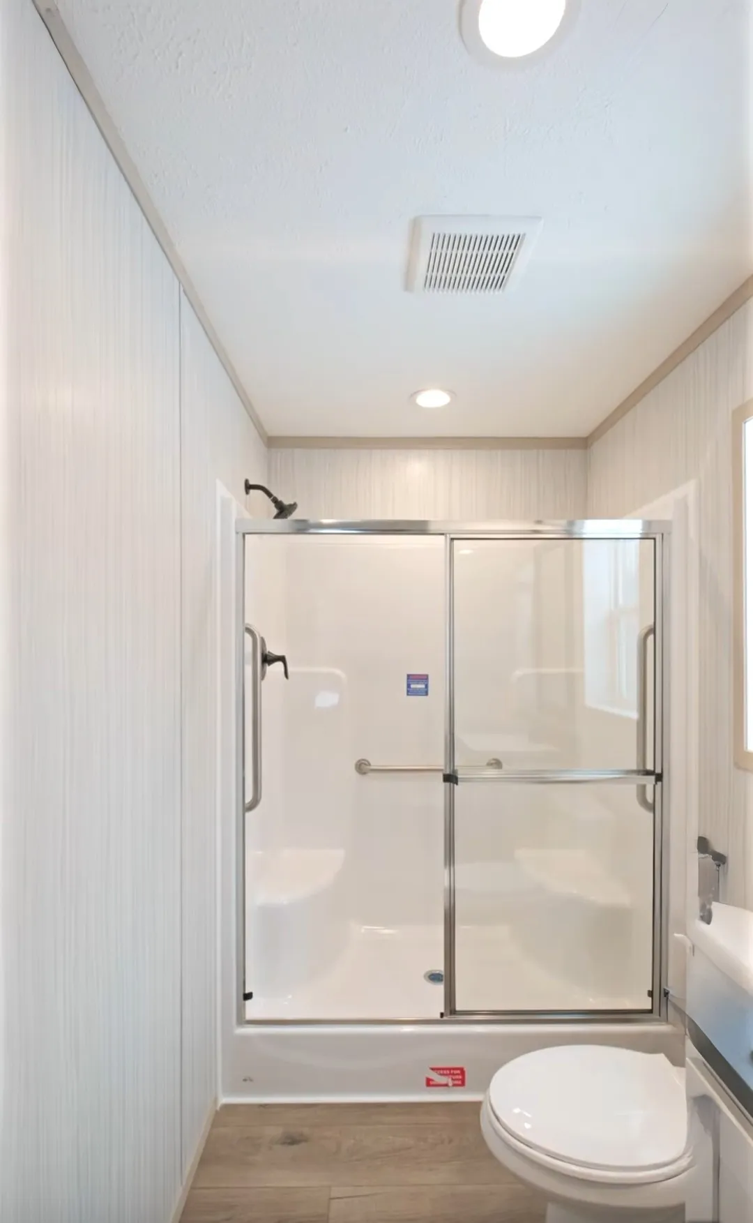 The TURQUOISE Guest Bathroom. This Manufactured Mobile Home features 2 bedrooms and 2 baths.