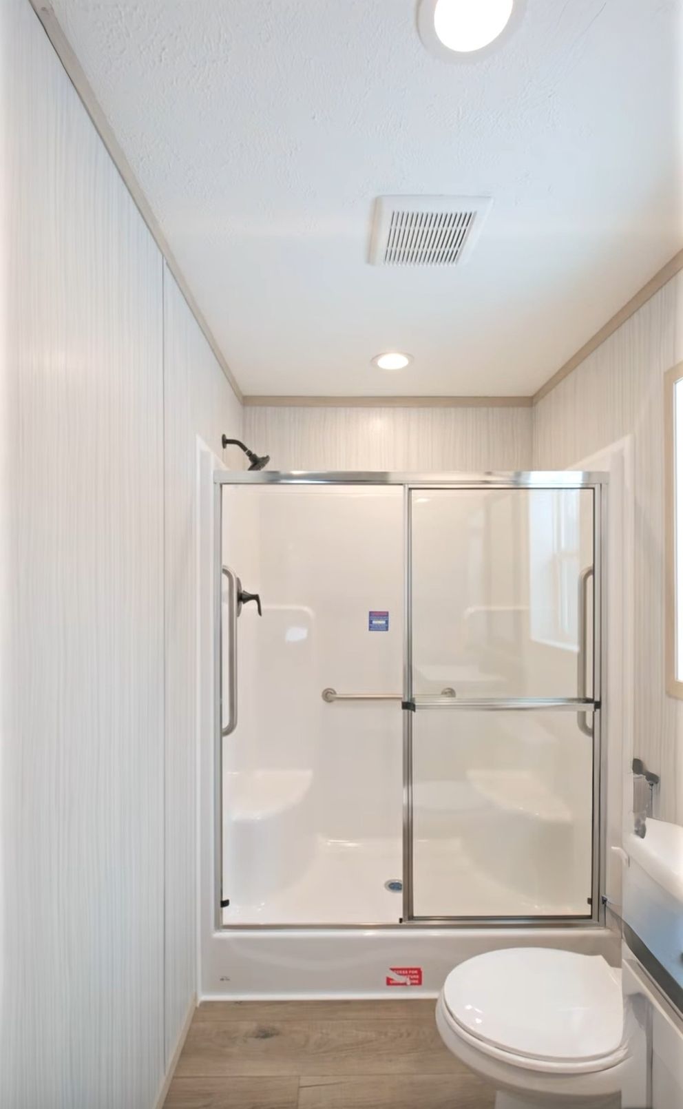 The TURQUOISE Guest Bathroom. This Manufactured Mobile Home features 2 bedrooms and 2 baths.