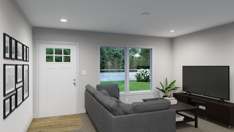 The SWEET DREAMS Living Room. This Manufactured Mobile Home features 3 bedrooms and 2 baths.