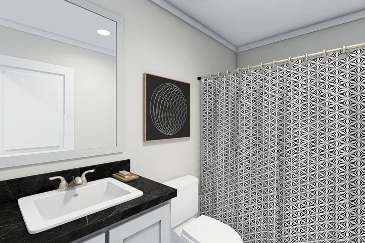 The CLASSIC 56D Guest Bathroom. This Manufactured Mobile Home features 3 bedrooms and 2 baths.