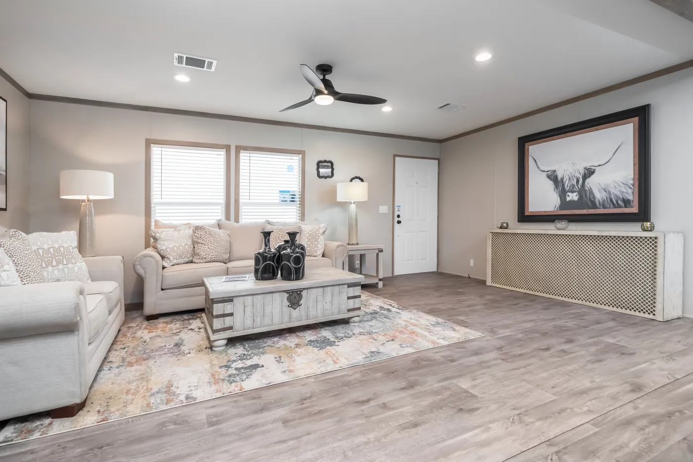 The PT 78 Living Room. This Manufactured Mobile Home features 3 bedrooms and 2 baths.