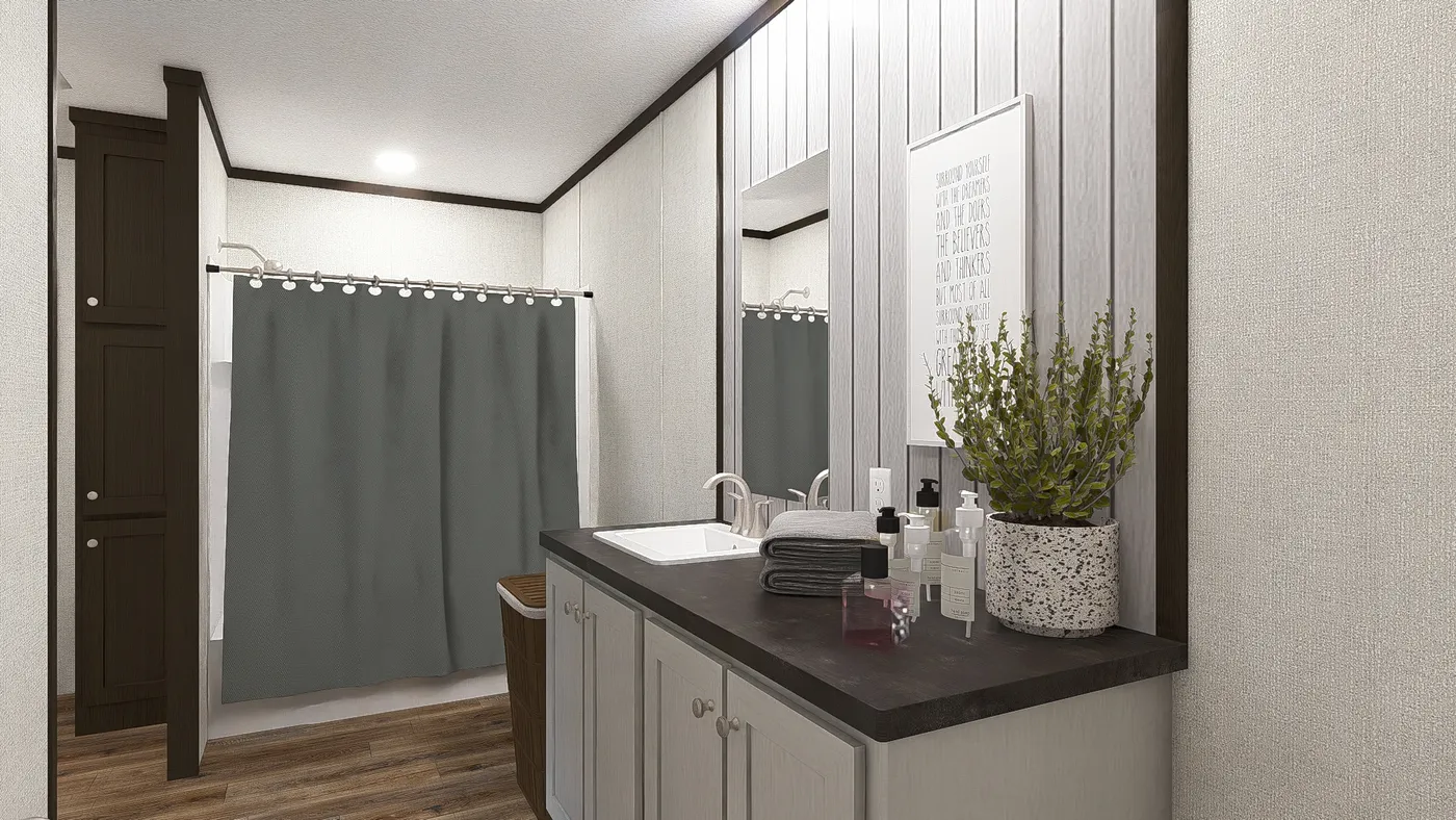 The EMPOWER Primary Bathroom. This Manufactured Mobile Home features 4 bedrooms and 2 baths.