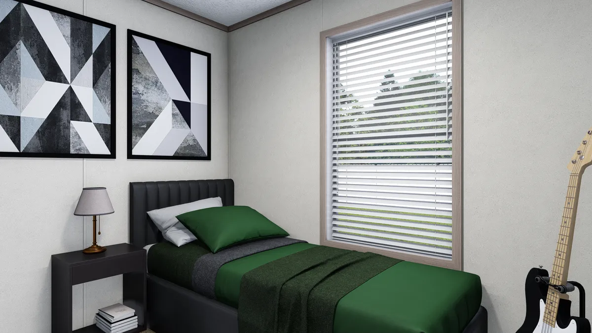 The 7614-4701 THE PULSE Guest Bedroom. This Manufactured Mobile Home features 3 bedrooms and 2 baths.