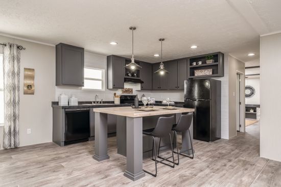 The TRADITION 60B Kitchen. This Manufactured Mobile Home features 3 bedrooms and 2 baths.
