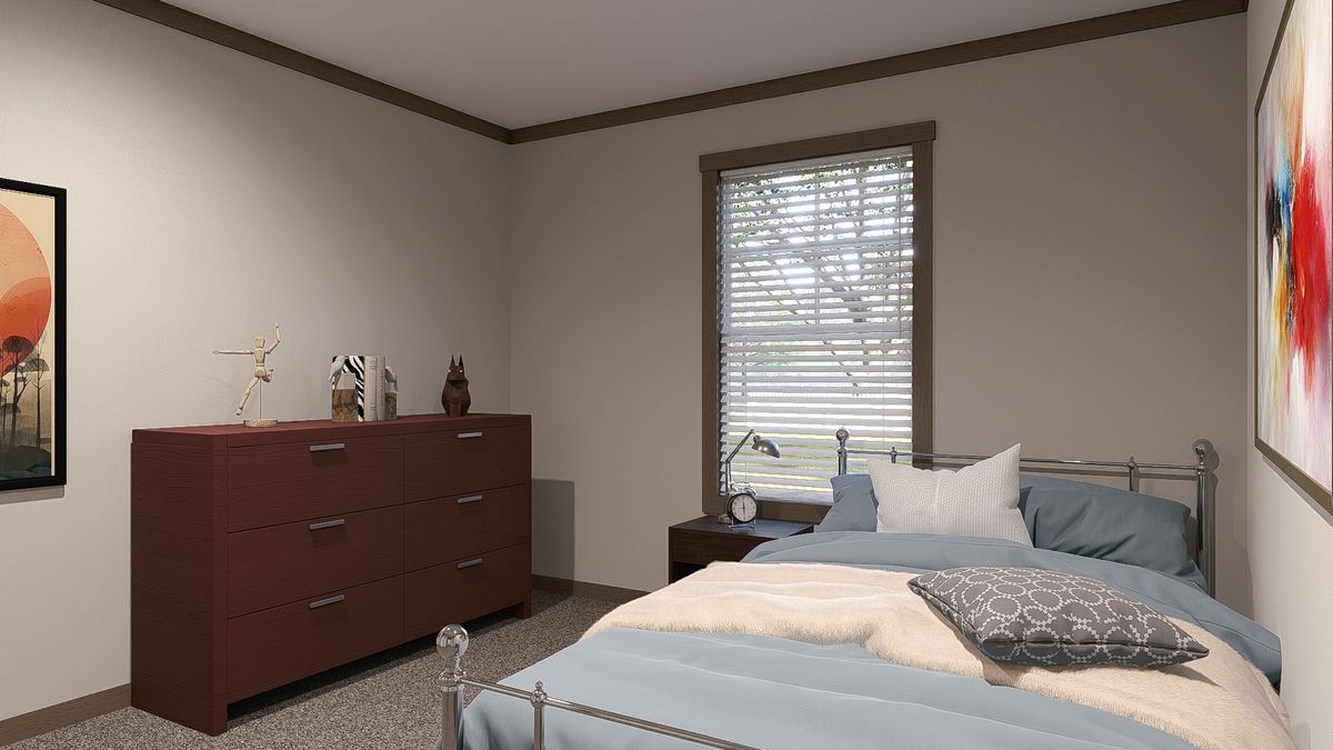 The EMILIE ELITE Guest Bedroom. This Manufactured Mobile Home features 3 bedrooms and 2 baths.