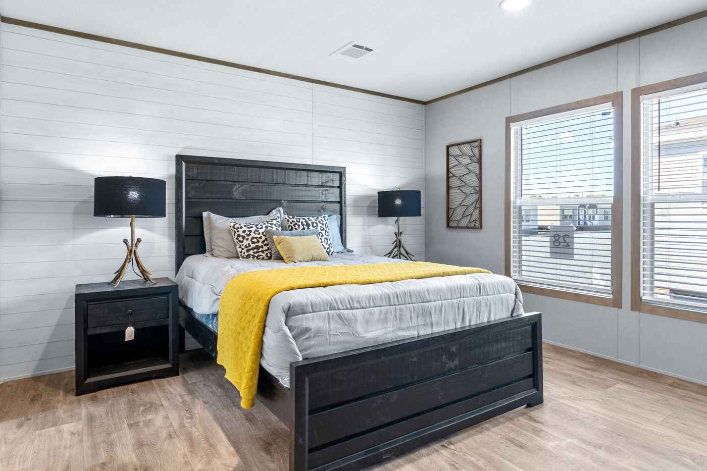 The PT 78 Primary Bedroom. This Manufactured Mobile Home features 3 bedrooms and 2 baths.