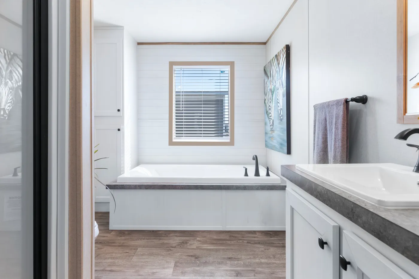 The PT 78 Primary Bathroom. This Manufactured Mobile Home features 3 bedrooms and 2 baths.