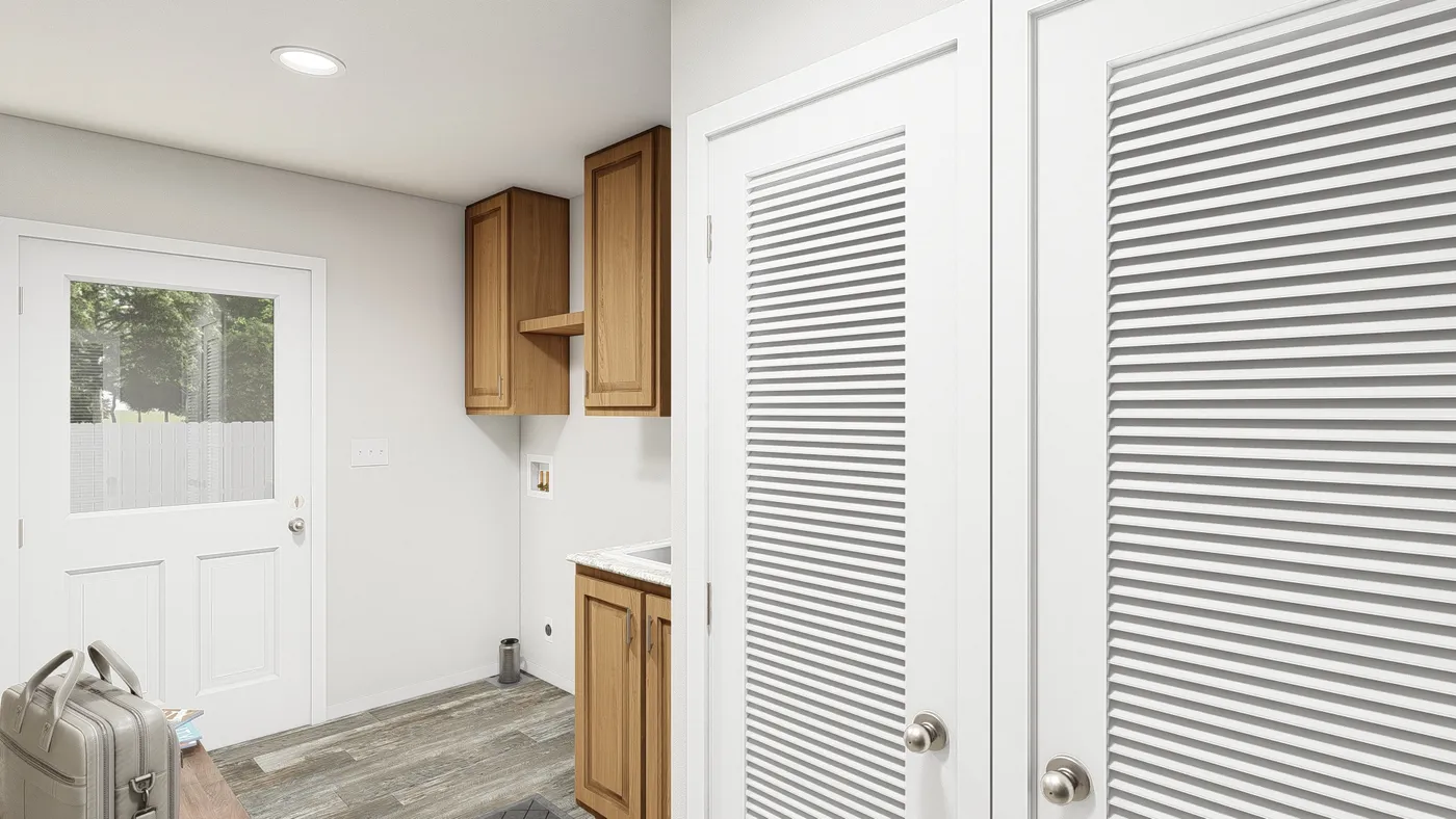 The DRM711F 71'              DREAM Utility Room. This Manufactured Mobile Home features 5 bedrooms and 3 baths.