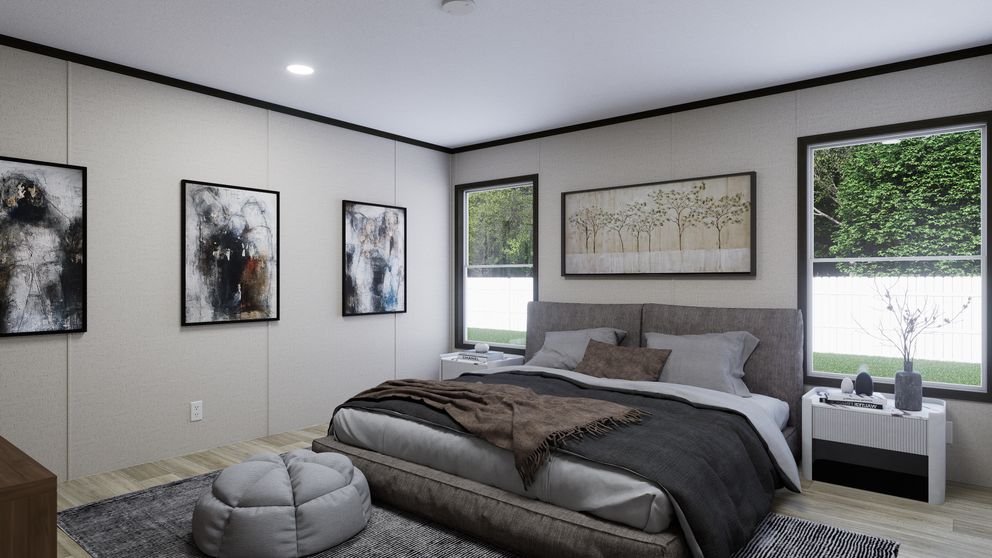 The FLOURISH Primary Bedroom. This Manufactured Mobile Home features 3 bedrooms and 2 baths.