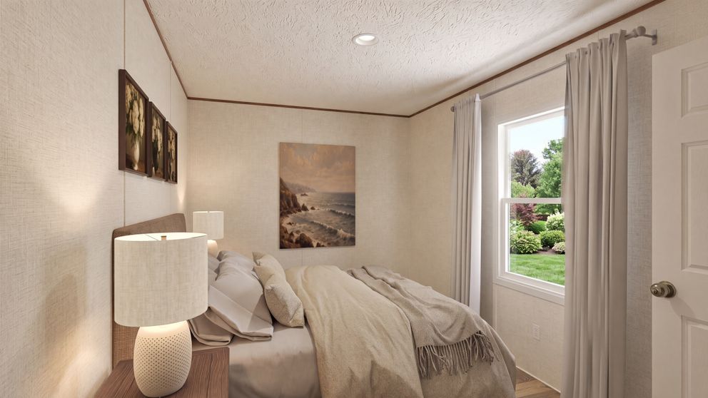 The BIRCH Guest Bedroom. This Manufactured Mobile Home features 3 bedrooms and 2 baths.