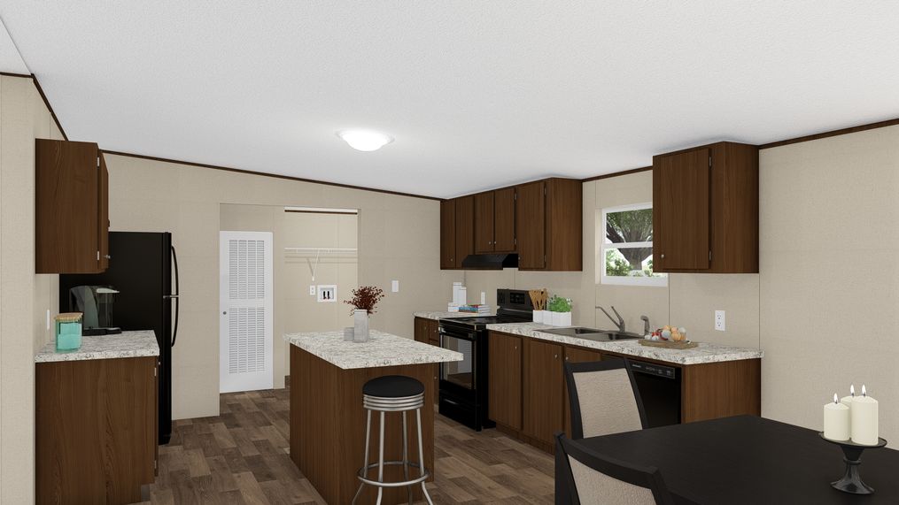The THRILL Kitchen. This Manufactured Mobile Home features 3 bedrooms and 2 baths.