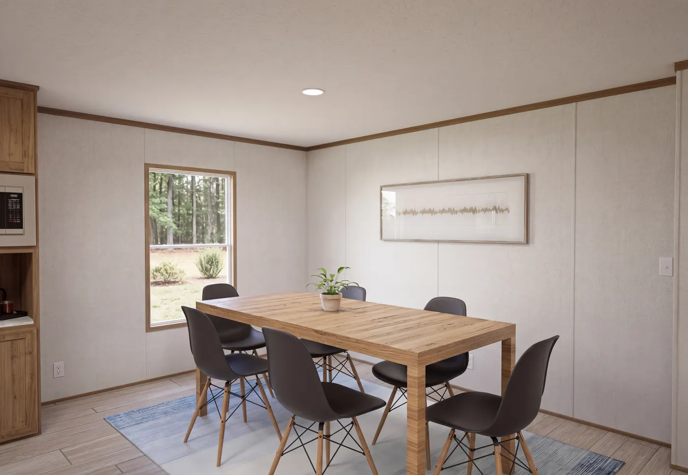 The THE MOUNTAINEER 68 Dining Area. This Manufactured Mobile Home features 4 bedrooms and 2 baths.