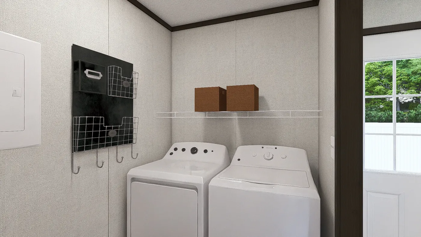 The COLOSSAL Utility Room. This Manufactured Mobile Home features 3 bedrooms and 2 baths.