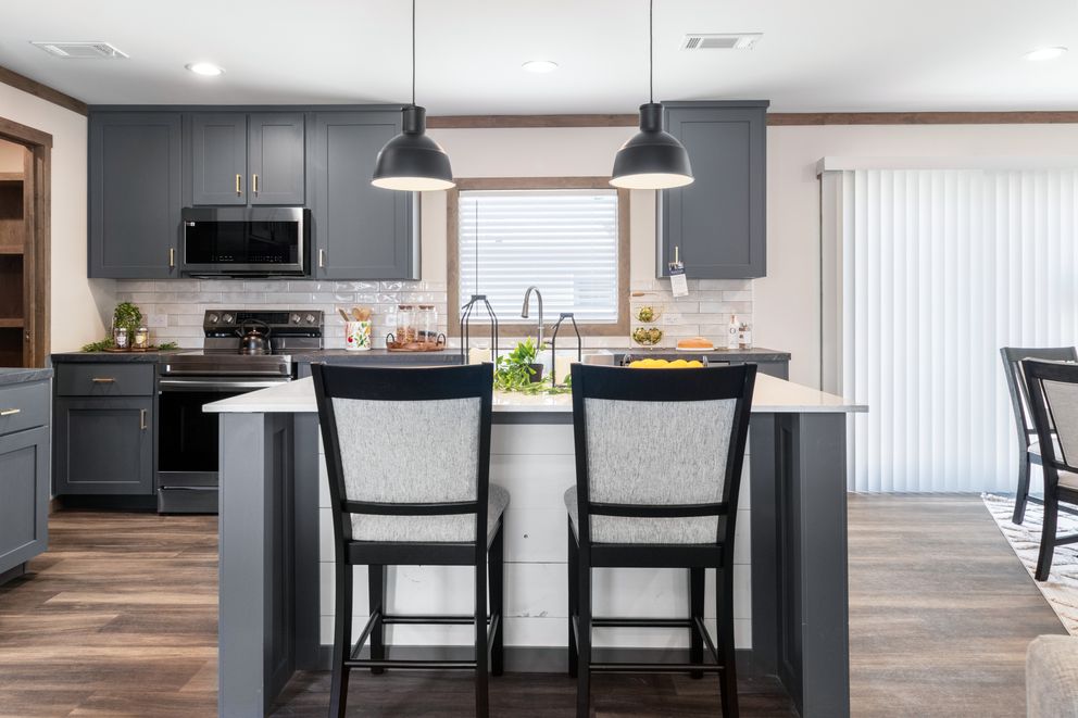 The FARM 4 FLEX Kitchen. This Manufactured Mobile Home features 4 bedrooms and 3 baths.