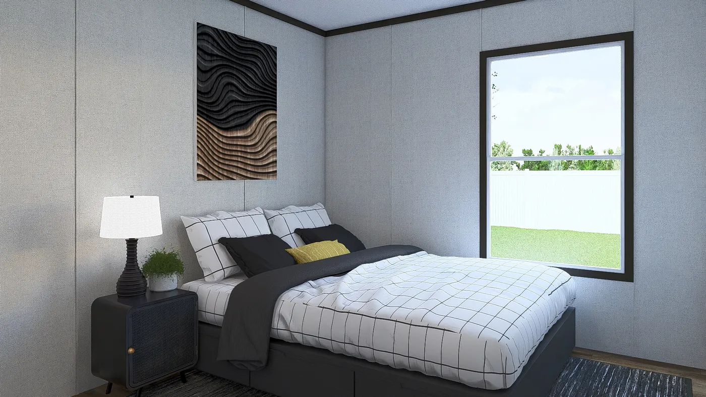 The GLIMPSE Guest Bedroom. This Manufactured Mobile Home features 3 bedrooms and 2 baths.