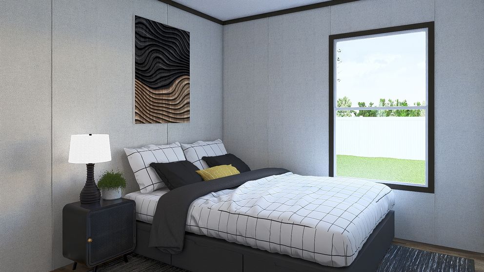 The GLIMPSE Guest Bedroom. This Manufactured Mobile Home features 3 bedrooms and 2 baths.