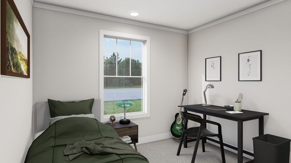 The THREE LITTLE BIRDS Guest Bedroom. This Manufactured Mobile Home features 3 bedrooms and 2 baths.