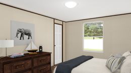 The EXCITEMENT Guest Bedroom. This Manufactured Mobile Home features 3 bedrooms and 2 baths.