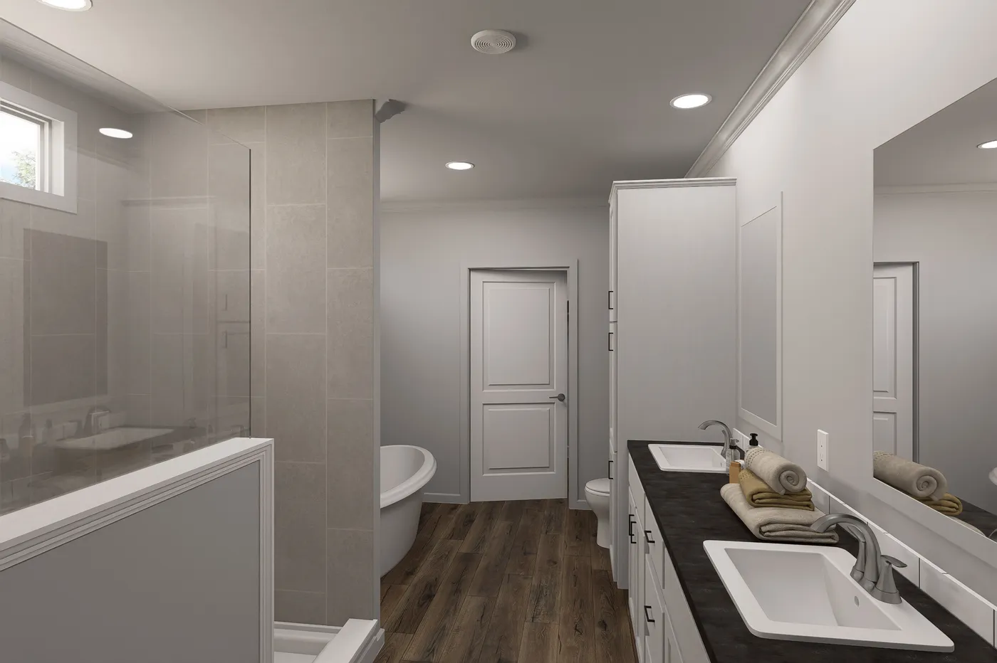 The THE VAIL 4 Primary Bathroom. This Manufactured Mobile Home features 4 bedrooms and 3 baths.