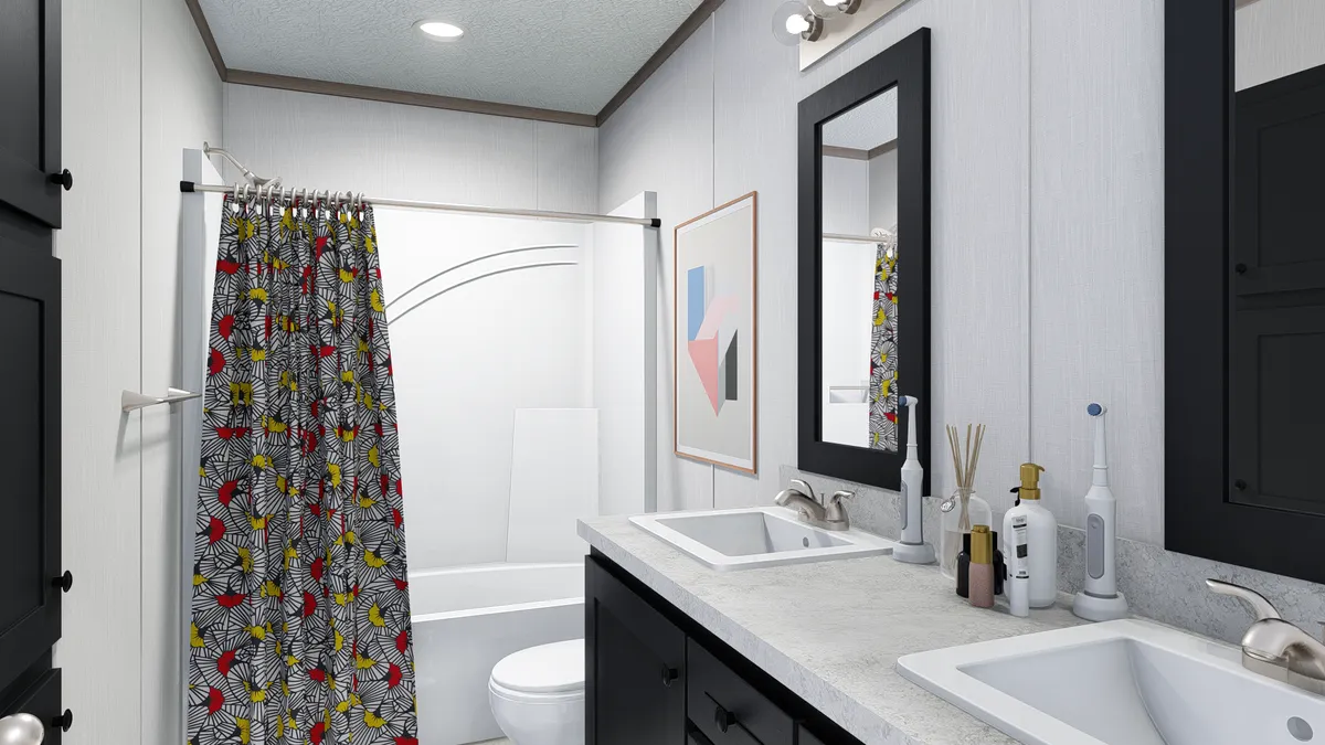 The 5624-E744 THE PULSE Primary Bathroom. This Manufactured Mobile Home features 3 bedrooms and 2 baths.
