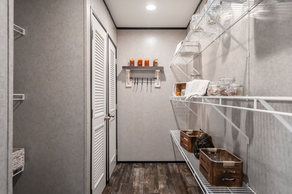 The THE TRIBUTARY Exterior. This Manufactured Mobile Home features 3 bedrooms and 2 baths.