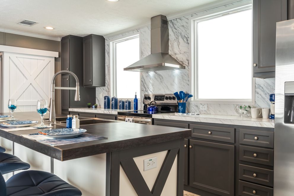 The MAJOR Kitchen. This Manufactured Mobile Home features 3 bedrooms and 2 baths.