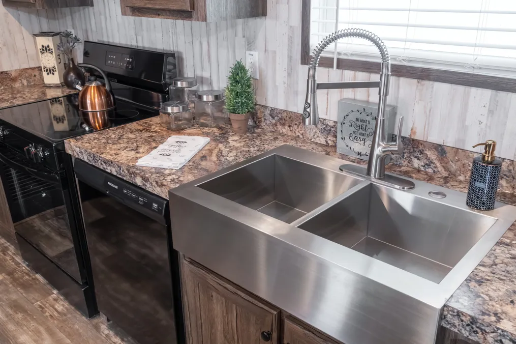 The HARDIN Kitchen. This Manufactured Mobile Home features 3 bedrooms and 2 baths.