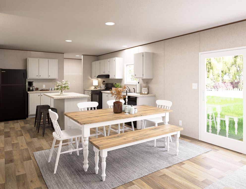 The OAK Dining Area. This Manufactured Mobile Home features 4 bedrooms and 2 baths.