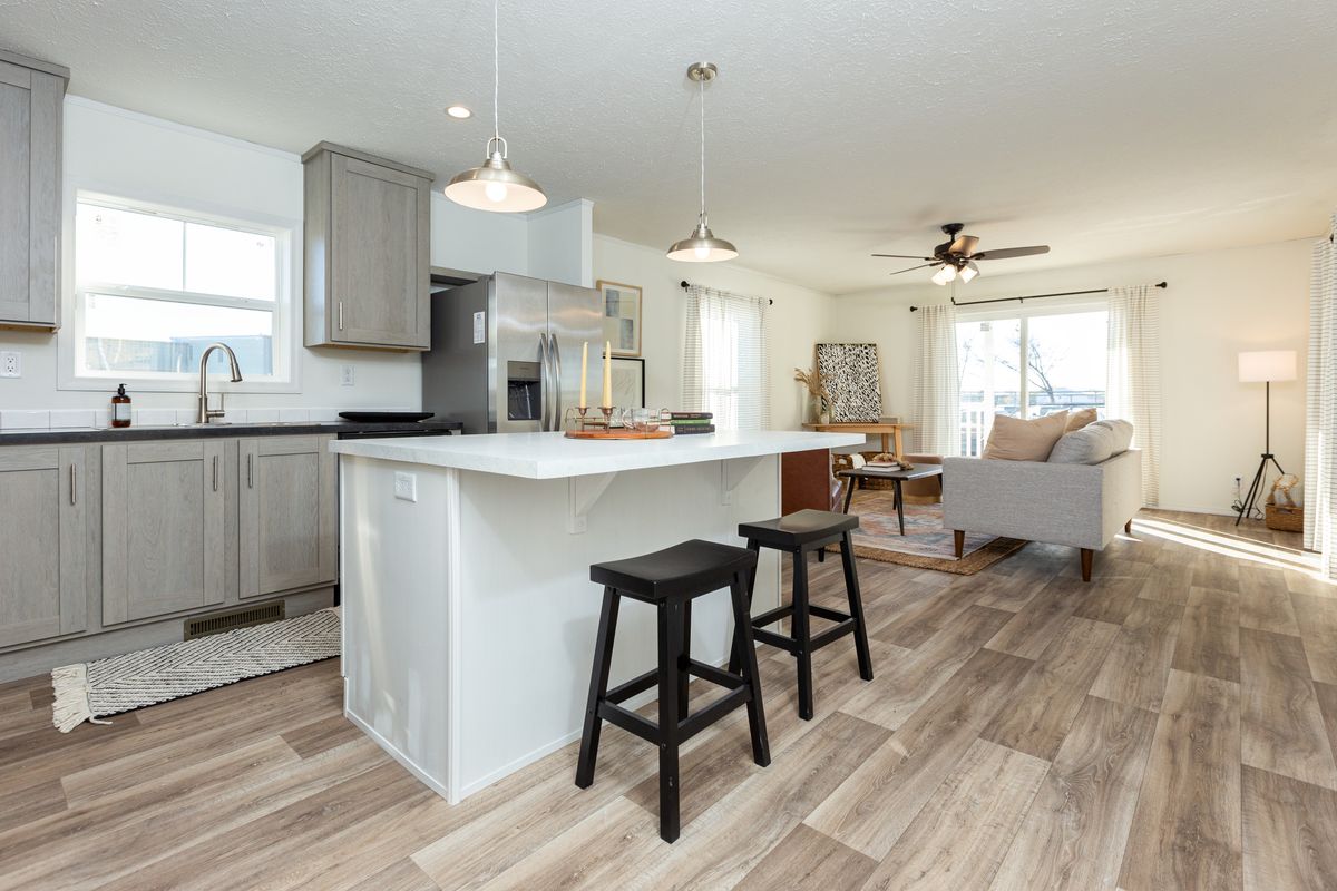 The LIFESTYLE 208 Kitchen. This Manufactured Mobile Home features 3 bedrooms and 2 baths.