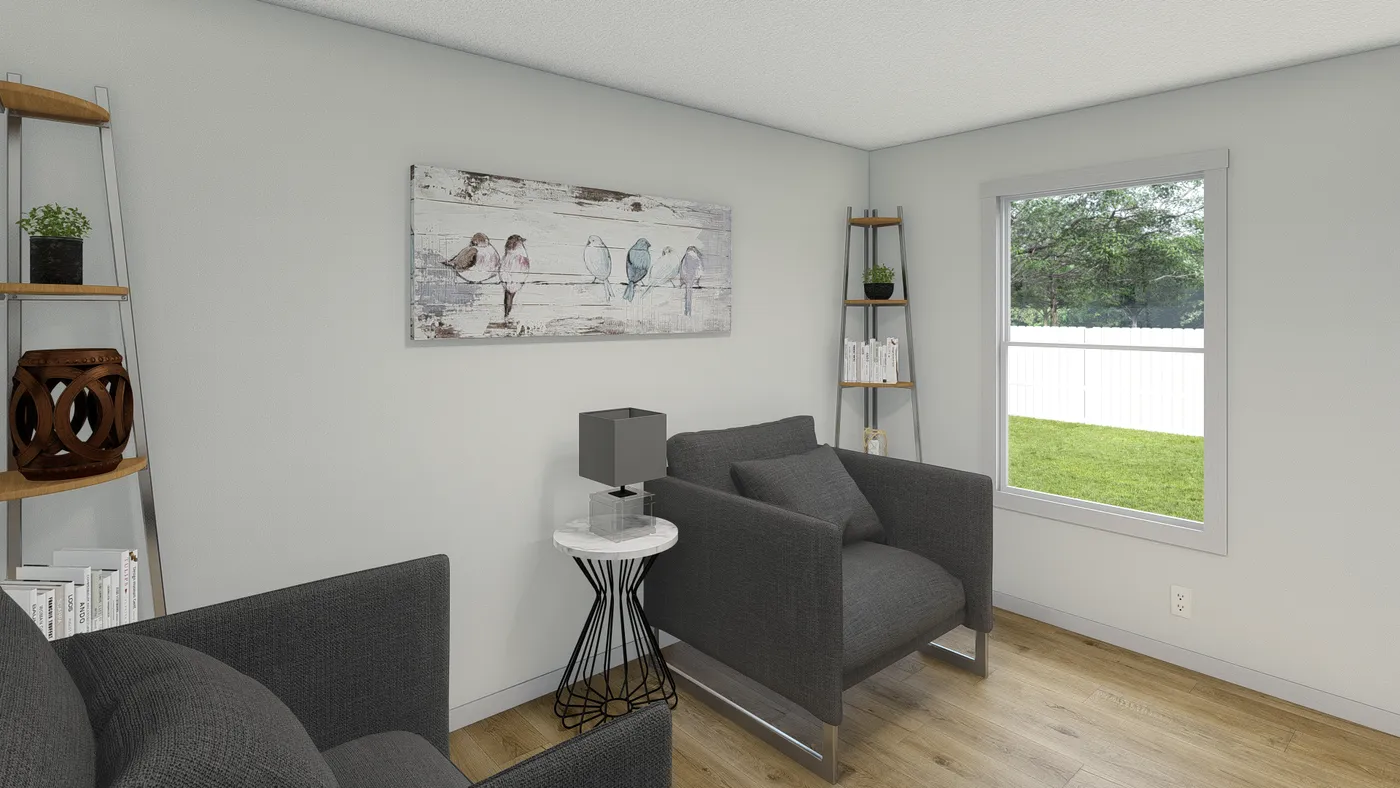 The ROCKET MAN Den. This Manufactured Mobile Home features 3 bedrooms and 2 baths.